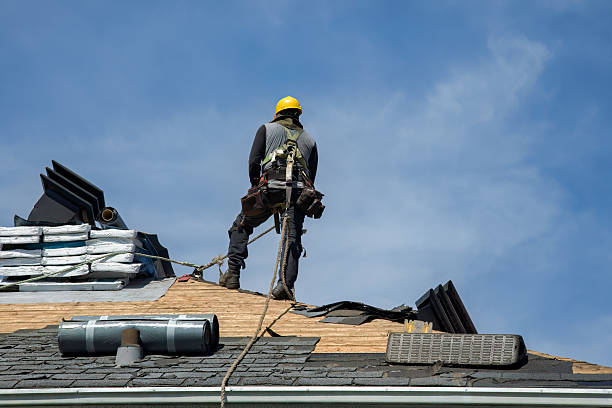 Professional Roofing technician working in Columbus Junction, IA
